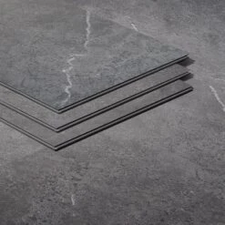 Artmore Tile Rogue Sandstone Dark Gray 12-in X 24-in Waterproof Interlocking Luxury Flooring (28.04-sq Ft)